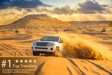 Overnight Red Dunes Desert Safari with Dune Bashing, BBQ & Breakfast